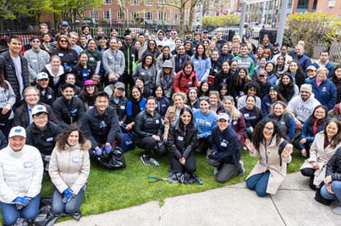 Large group of Tufts University members posed for photo